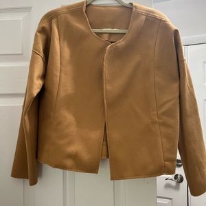 Cute cropped jacket. Great for layering